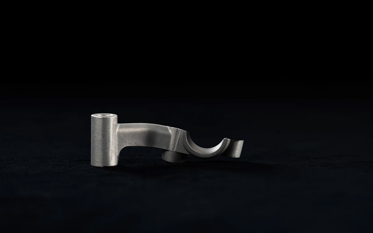 Left handguard bracket for rear foot brake setup