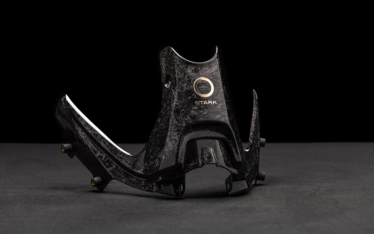 Carbon fiber subframe with gold logo